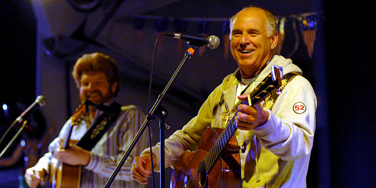 Musician Jimmy Buffett on stage during a live performance