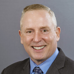Headshot of Michael Riordan