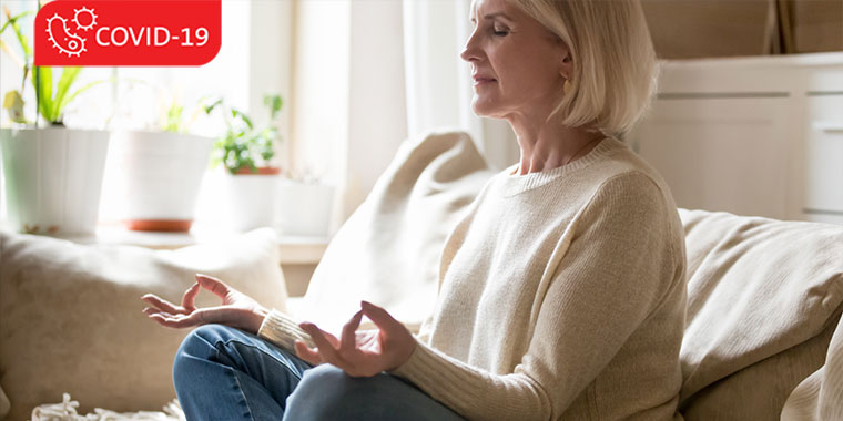 Senior aged woman meditating