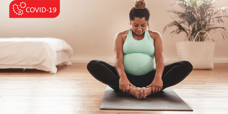 Pregnant woman doing yoga