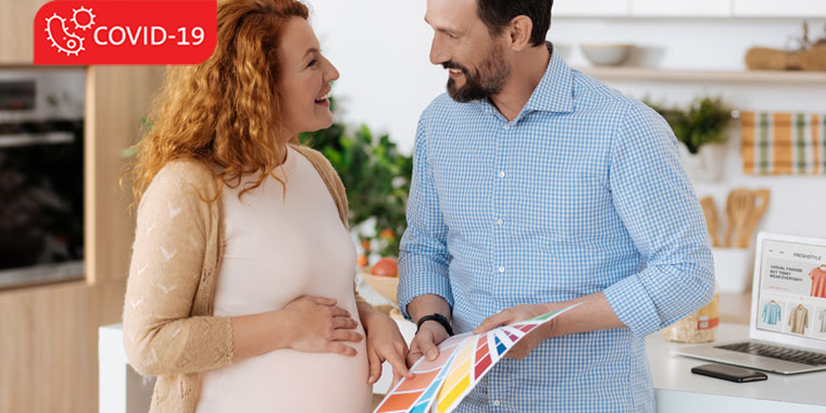Pregnant woman chatting with male